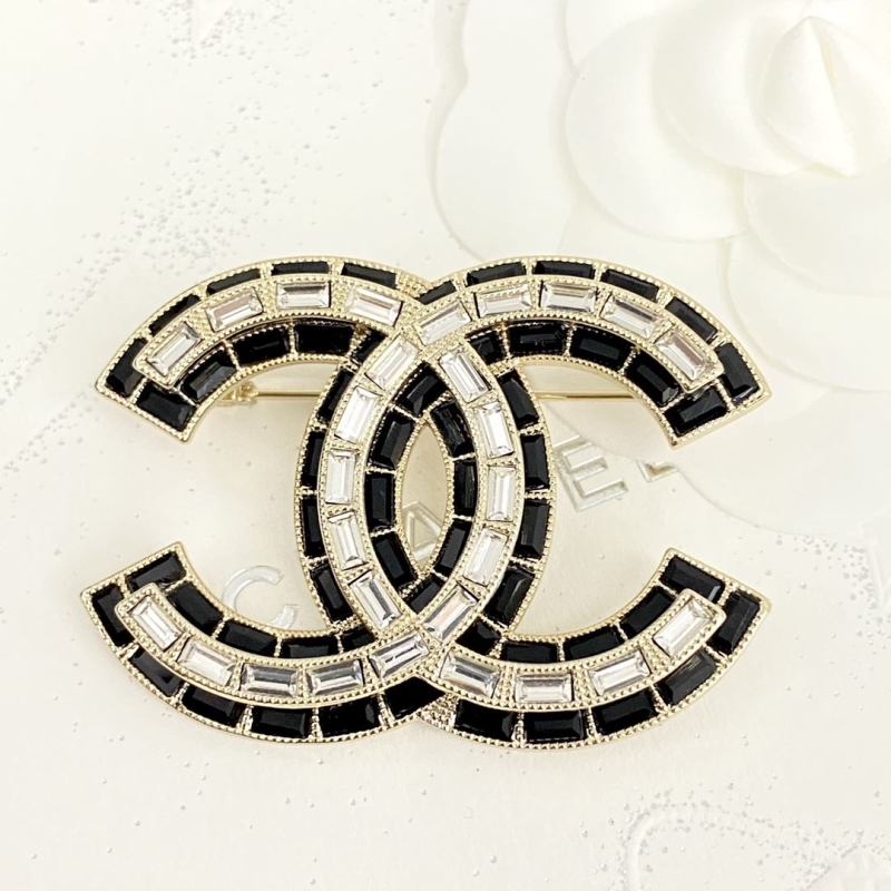 Ch*el brooches